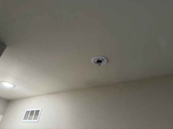 Missing smoke alarm on a ceiling mount found during an investor inspection in the Kansas City area